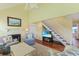 Bright living room with vaulted ceilings, fireplace, and hardwood floors at 25 Frigate Ct., Pawleys Island, SC 29585