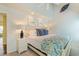 Main bedroom with king-size bed and en-suite bathroom at 25 Frigate Ct., Pawleys Island, SC 29585