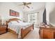 Large bedroom with a king-size bed and TV at 257 Connemara Dr. # E, Myrtle Beach, SC 29579