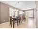 Bright dining area with table and chairs near kitchen at 257 Connemara Dr. # E, Myrtle Beach, SC 29579