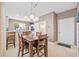 Dining area with a table for six and access to the kitchen at 257 Connemara Dr. # E, Myrtle Beach, SC 29579