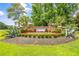 Community entrance with landscaped grounds and signage at 257 Connemara Dr. # E, Myrtle Beach, SC 29579