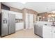 Spacious kitchen with stainless steel appliances and white cabinets at 257 Connemara Dr. # E, Myrtle Beach, SC 29579