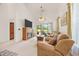 Relaxing living room with fireplace and view of backyard at 257 Connemara Dr. # E, Myrtle Beach, SC 29579
