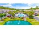 Community pool with surrounding patio and landscaping at 257 Connemara Dr. # E, Myrtle Beach, SC 29579