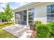 Screened porch with patio furniture overlooking backyard at 257 Connemara Dr. # E, Myrtle Beach, SC 29579