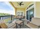 Relaxing covered balcony featuring seating and beautiful water views at 265 Venice Way # 1101, Myrtle Beach, SC 29577