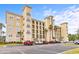 Stately condo building with ample parking and mature palm trees at 265 Venice Way # 1101, Myrtle Beach, SC 29577