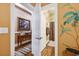 Hallway view leading to a decorated bathroom, offering a glimpse of the home's interior design at 265 Venice Way # 1101, Myrtle Beach, SC 29577