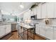 Bright kitchen featuring white cabinetry, modern appliances, and island at 265 Venice Way # 1101, Myrtle Beach, SC 29577