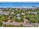 Aerial view of beach home near ocean and marsh at 298 Myrtle Ave., Pawleys Island, SC 29585