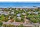 Aerial view of beach house near ocean, showing surrounding houses at 298 Myrtle Ave., Pawleys Island, SC 29585