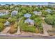 Aerial view of beach house near ocean, showing surrounding houses at 298 Myrtle Ave., Pawleys Island, SC 29585