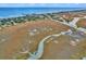 Aerial view of oceanfront community and beach at 298 Myrtle Ave., Pawleys Island, SC 29585