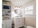Charming bathroom with white vanity and subway tile at 301 North Main St., Hemingway, SC 29554