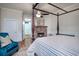 Spacious bedroom with fireplace and access to hallway at 301 North Main St., Hemingway, SC 29554