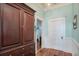 Bright hallway with built-in storage and access to other rooms at 301 North Main St., Hemingway, SC 29554