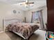 Well lit bedroom with a white wicker bed frame and window coverings at 303 Flagstone Dr., Myrtle Beach, SC 29588