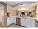 Modern kitchen with stainless steel appliances and granite countertops at 305 Myrtlewood Ct. # 18C, Myrtle Beach, SC 29572