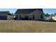 Spacious backyard with plenty of room for outdoor activities at 328 Blue Rock Dr., Longs, SC 29568