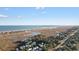 Aerial view showcasing the community's proximity to the beach at 34 Lazy Hammock Trail, Pawleys Island, SC 29585