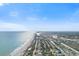 Aerial view of coastal community with oceanfront homes and waterways at 34 Lazy Hammock Trail, Pawleys Island, SC 29585