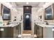 Large bathroom with double vanity, walk-in shower, and marble countertops at 34 Lazy Hammock Trail, Pawleys Island, SC 29585