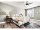Main bedroom with a king-size bed, nightstands, and ceiling fan at 34 Lazy Hammock Trail, Pawleys Island, SC 29585