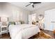 Bright bedroom with a queen-size bed and access to a private bathroom at 34 Lazy Hammock Trail, Pawleys Island, SC 29585