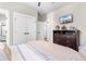 Spacious bedroom with dresser, closet, and neutral colors at 34 Lazy Hammock Trail, Pawleys Island, SC 29585