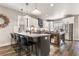 Modern kitchen with an island and breakfast bar, white and gray cabinets at 34 Lazy Hammock Trail, Pawleys Island, SC 29585