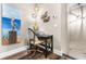 Home office with a desk, chair, and coastal-themed artwork at 34 Lazy Hammock Trail, Pawleys Island, SC 29585