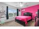 Pink bedroom with a double bed and a large window at 341 N Bar Ct., Myrtle Beach, SC 29579