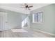 Bedroom with natural light, ample closet space, and modern vinyl floors at 38 Shadow Moss Pl. # 38, North Myrtle Beach, SC 29582