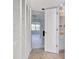 Hallway leading to the bathroom and living space providing a connected and accessible home design at 38 Shadow Moss Pl. # 38, North Myrtle Beach, SC 29582