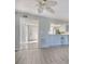 Bright, open living room and hallway leading to the front door and kitchen at 38 Shadow Moss Pl. # 38, North Myrtle Beach, SC 29582