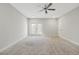Bedroom with balcony access and carpeted floor at 395 S Crow Creek Dr. # 1621, Calabash, NC 28467