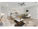 Bright dining area with wood-look floors and adjacent living room at 395 S Crow Creek Dr. # 1621, Calabash, NC 28467