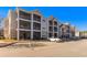 Two story apartment building with parking and balconies at 395 S Crow Creek Dr. # 1621, Calabash, NC 28467