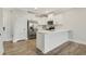 Modern kitchen with white cabinets and stainless steel appliances at 395 S Crow Creek Dr. # 1621, Calabash, NC 28467