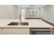 Modern kitchen with island, stainless steel appliances and hardwood floors at 395 S Crow Creek Dr. # 1621, Calabash, NC 28467