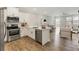 Open concept kitchen with living and dining area view at 395 S Crow Creek Dr. # 1621, Calabash, NC 28467