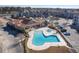 Resort-style pool with clubhouse and surrounding apartment buildings at 395 S Crow Creek Dr. # 1621, Calabash, NC 28467