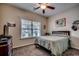 Second bedroom with window, ceiling fan and carpet at 4060 Woodcliffe Dr., Conway, SC 29526