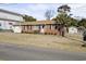 Brick ranch home with a large yard at 408 16Th Ave. S, Myrtle Beach, SC 29577