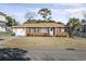 Brick ranch home with a spacious yard at 408 16Th Ave. S, Myrtle Beach, SC 29577