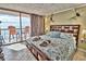 Main bedroom with king bed and ocean view at 4619 S Ocean Blvd. # 706, North Myrtle Beach, SC 29582