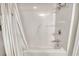 Simple bathroom with shower/tub combo and white accents at 4637 Lightkeepers Way # 4F, Little River, SC 29566