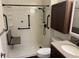 Updated bathroom with walk-in shower and grab bars at 5001 Little River Rd. # E-110, Myrtle Beach, SC 29577