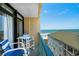 Charming balcony view overlooking ocean and beachfront condos at 501 S Ocean Blvd. # 708, North Myrtle Beach, SC 29582